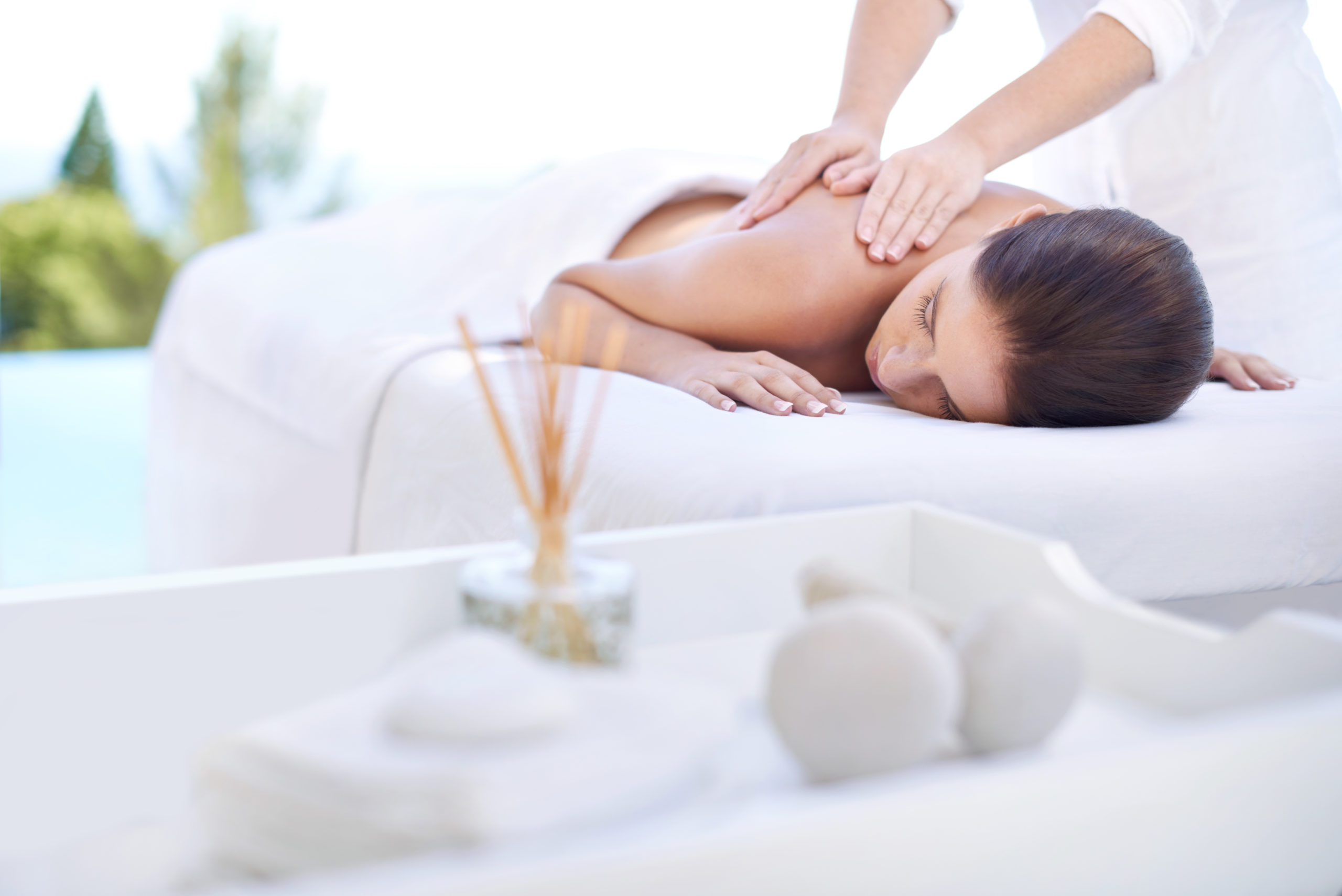 Cropped shot of a young woman enjoying a relaxing massage
